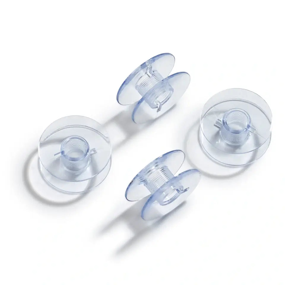 Sewing machine bobbins for rotary bobbin case